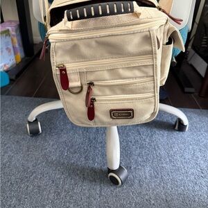 Elegant Beige Crossbody Bag with Red Accents